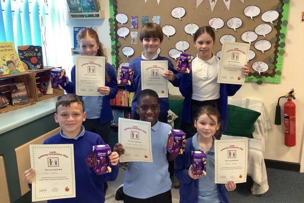 Children holding certificates 2